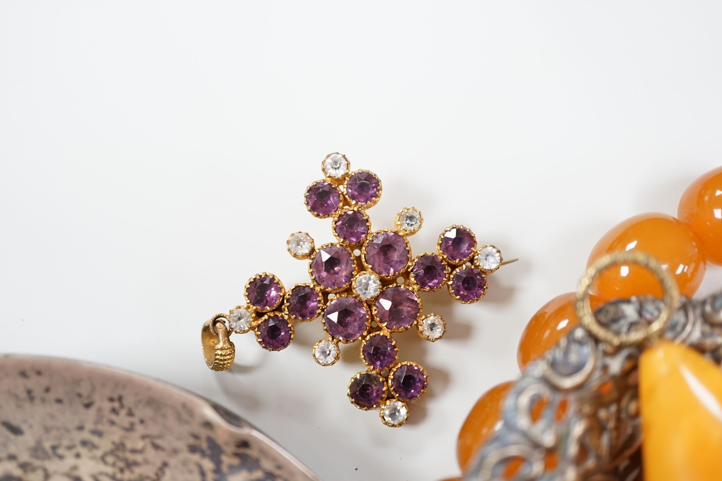 A group of assorted costume jewellery and other items including enamelled vinaigrette, amber pendant, Victorian pendant, Victorian albertina, silver vesta case, photograph frame, bonbon dish etc.